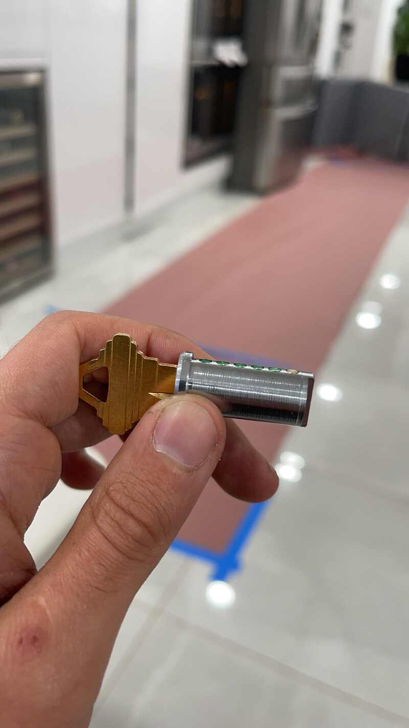 Lock cylinder removed for rekeying by a 1st Class Locksmith technician