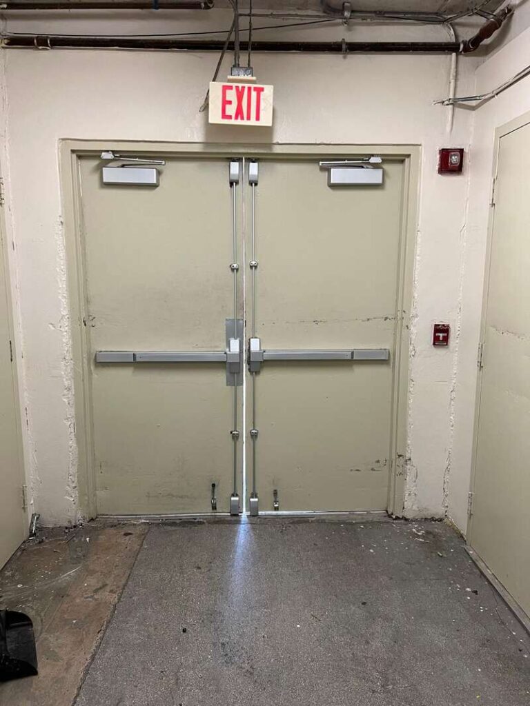 Double side Commercial Door with 2 push bars and rods going up and down