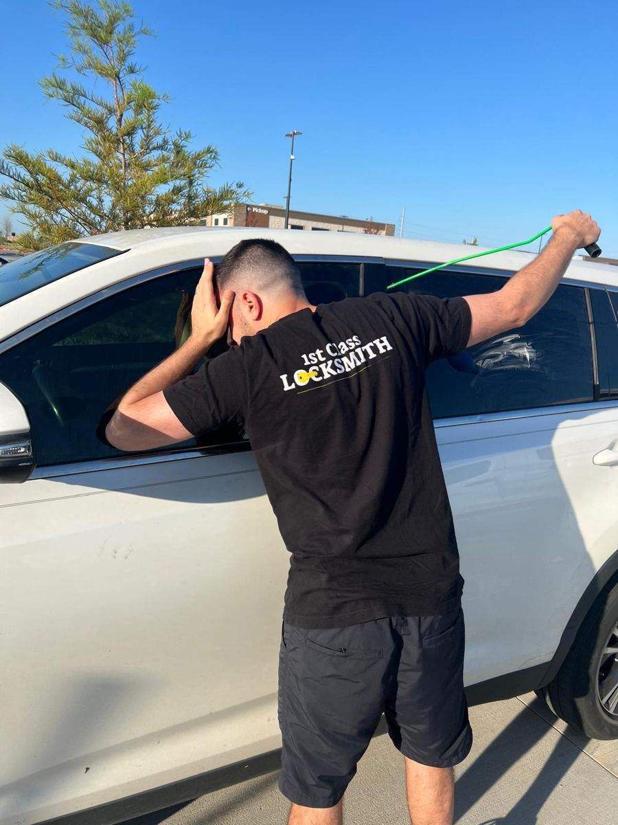Locksmith working on a car ignition in Frisco TX