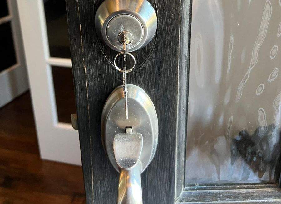 Deadbolt being rekeyed at a home in Frisco TX
